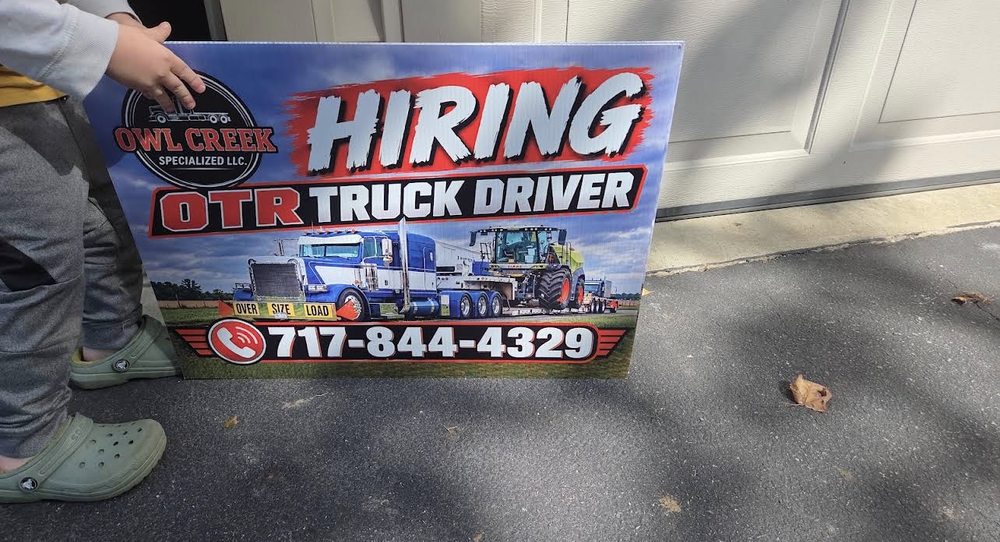 customer photos of yard sign plus