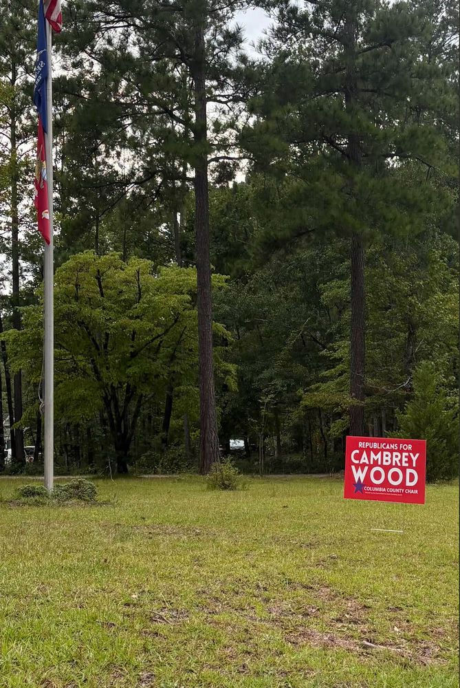 customer photos of yard sign plus