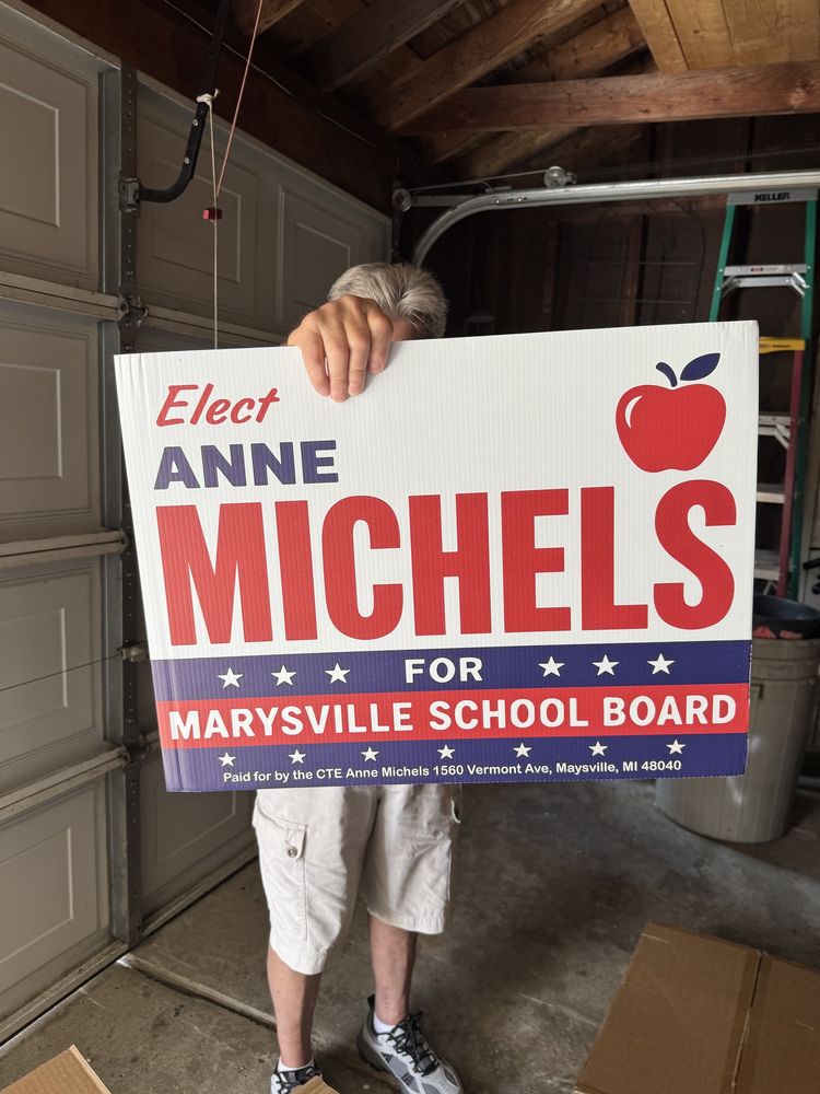 customer photos of yard sign plus