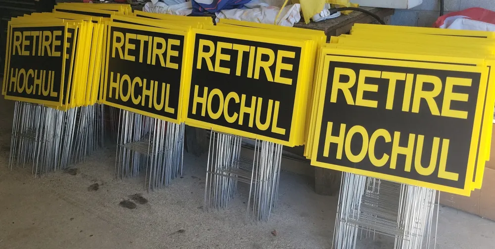 customer photos of yard sign plus