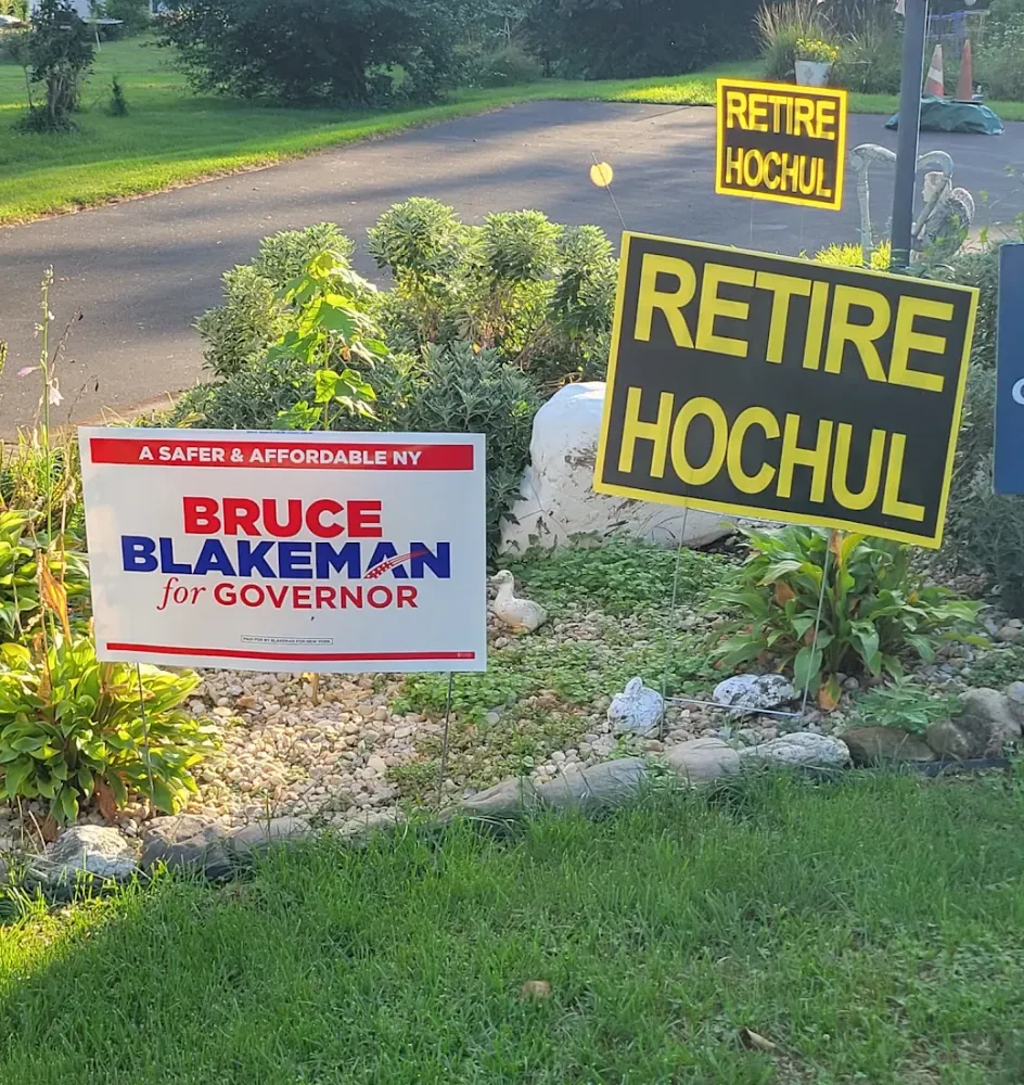 customer photos of yard sign plus